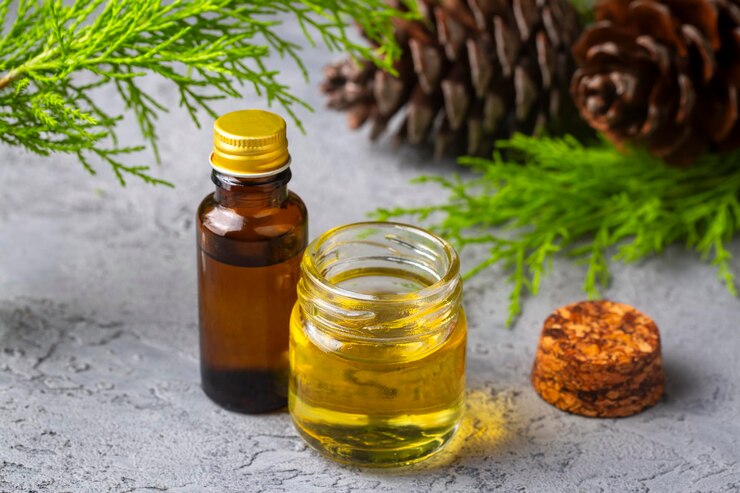 pine-turpentine-essential-oil-glass-bottle-with-pine-coniferous-leaves-pine-cone-kiefer-turpentin